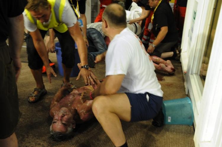 Russia's Vladimir Ladyzhenskiy is removed from the sauna after being burnt during the final at the Sauna World Championships in Heinola, on August 7. Last two competitors in the men's final had to be removed by force from the sauna.  (Sari Gustafsson/Getty Images )