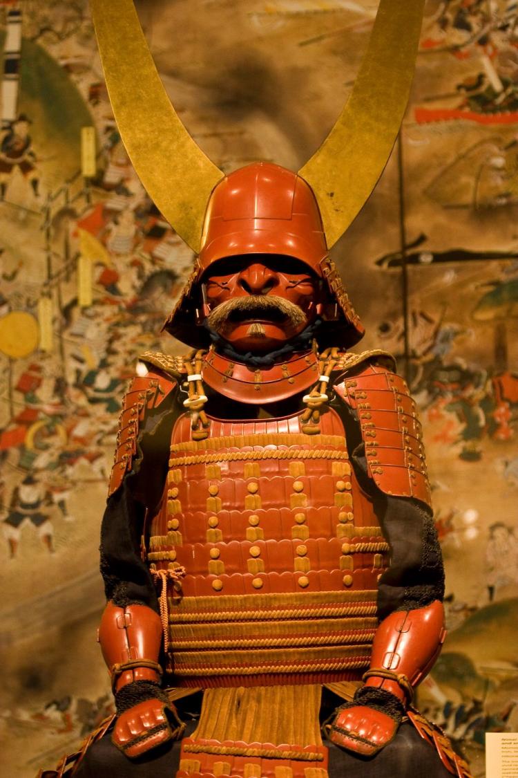 Majestic 17th century cuirass 'gusoku' armor with red lacquer and smoked-leather lacing, on display at the Metropolitan Museum of Art beginning Wednesday.  (Dan Skorbach/The Epoch Times)
