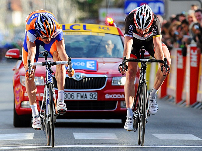 Luis Leon Sanchez (L) and German Jens Voigt (R) cross the finish line during the Paris-Nice cycling race's sixth stage between Suze-La-Rousse and Sisteron. (Pascal Pavani/AFP/Getty Images)