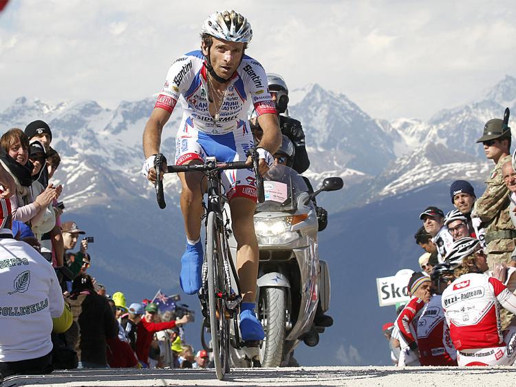 Michele Scarponi (here riding in Stage 16) helped Ivan Basso win the Maglia Rosa, and in return was allowed to win Stage 19 of the 2010 Giro d'Italia. (Luk Beines/AFP/Getty Images)