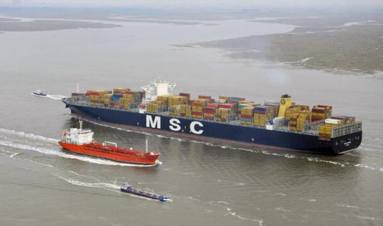 A ship enters the port of Antwerp via the Scheldt river.  (Dirk Waem/AFP/Getty Images)