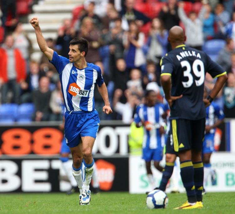 WIGAN WINS: Paul Scharner ended a strong performance with a late goal as Wigan stunned Chelsea 3-1 on Saturday. (Phil Cole/Getty Images)