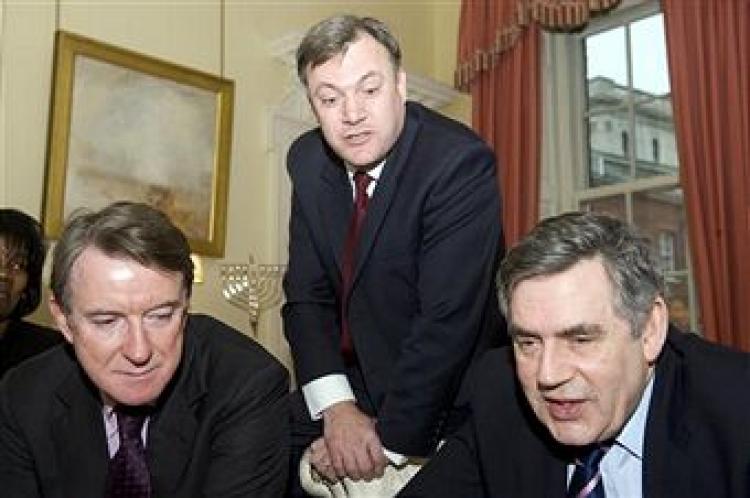Former British Business Secretary Peter Mandelson (L), Schools Secretary Ed Balls (C), and Prime Minister Gordon Brown pictured during a meeting to discuss the Home Access scheme at Downing Street, in London, on January 11, 2010. (PAUL GROVER/AFP/Getty Images)