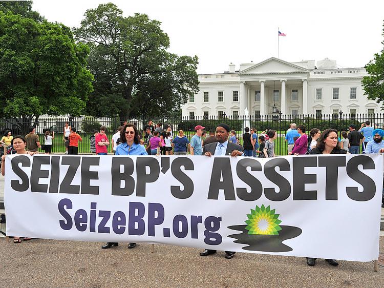 Representatives of the SeizeBP.org movement hold a large banner directly in front of the White House on June 15, 2010 during a protest in Washington, DC. (Karen Bleier/AFP/Getty Images)