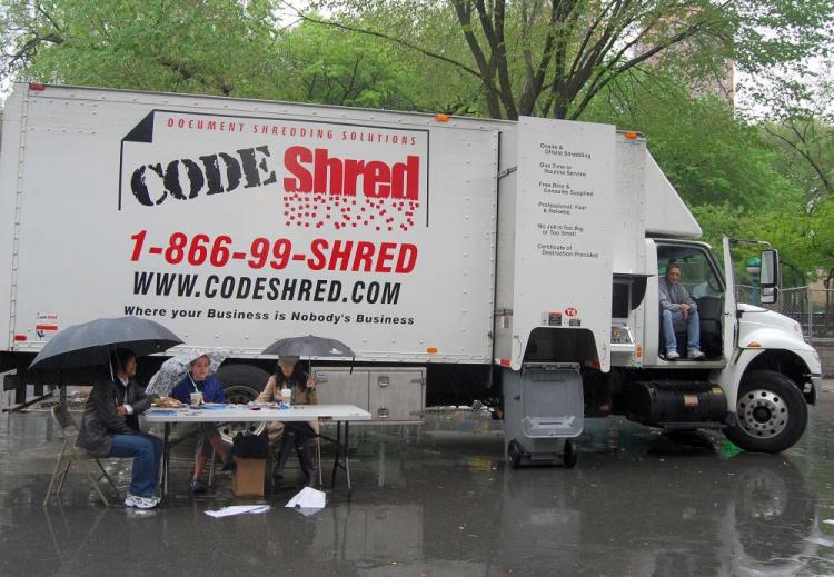 A truck with industrial shredders awaits consumers to bring their personal documents for free shredding at the second annual Shred Fest in Union Square Park. Shredding machines were stationed at 11 sites throughout the city on Sunday. (Catherine Yang/The Epoch Times)