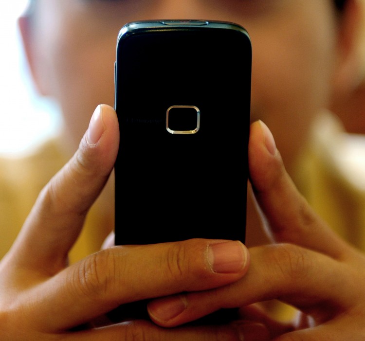 NEW APP: A new smartphone app could help people file insurance claims. ( Frank Lee/AFP/Getty Images)