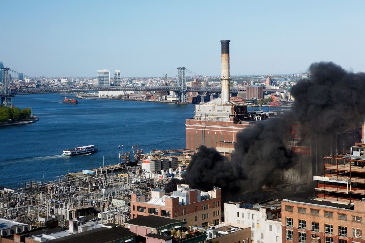 Smoke rises from a Con Edison power plant