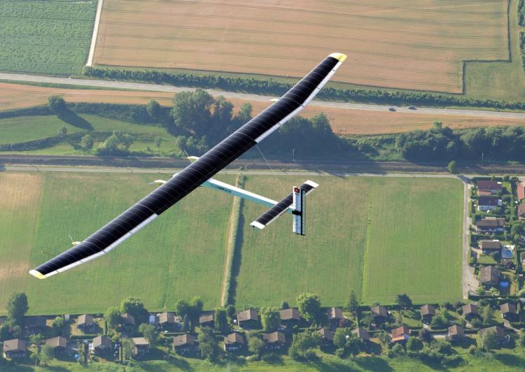 Solar Impulse's Chief Executive Officer and pilot Andre Borschberg fly in the solar-powered HB-SIA prototype airplane during its first successful night flight attempt at Payerne airport July 8.  (Denis Bailbouse/Getty Images)