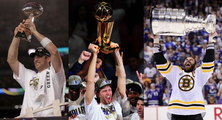 THREE UNDERDOGS: Aaron Rodgers of the Green Bay Packers holds up The Vince Lombardi Trophy after beating the Pittsburgh Steelers in the Superbowl; Dirk Nowitzki of the Dallas Mavericks holds the Larry O'Brien Trophy after defeating the Miami Heat in the NBA Final; Zdeno Chara of the Boston Bruins celebrates with the Stanley Cup after defeating the Vancouver Canucks. (Doug Pensinger, Harry How, Mark Ralston/Getty Images )