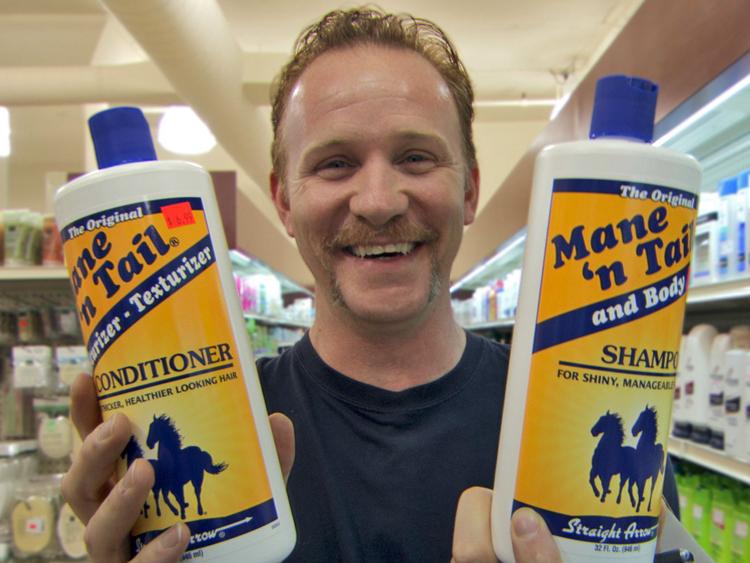 PITCH MAN: Morgan Spurlock poses with one of the branded products he approached for placement in 'POM Wonderful Presents: The Greatest Movie Ever Sold,' his documentary about product placement. (Daniel Marracino/Sony Pictures Classics )