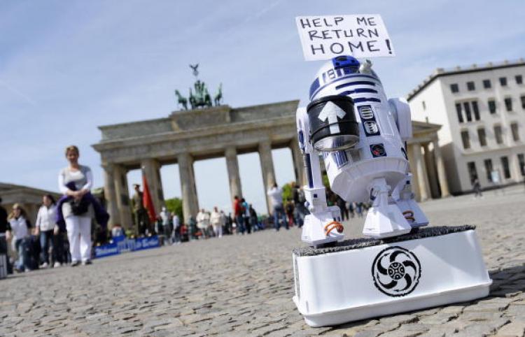 Star Wars Day 2010: May the 4th be With You! The robot R2D2 from the Star Wars movies collects money for his journey home in front of the Brandenburg Gate in Berlin on May 5, 2010. (Michael Gottschalk/AFP/Getty Images)