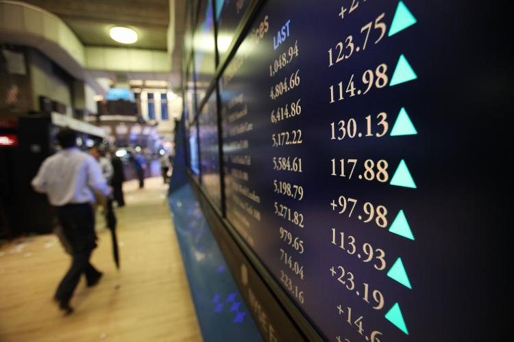 Stock prices soared to a five-month high on October 5. The Dow finished up nearly 200 points to close at 10,944.72. (Mario Tama/Getty Images) Stock prices soared to a five-month high on October 5. The Dow finished up nearly 200 points to close at 10,944.72. (Mario Tama/Getty Images)