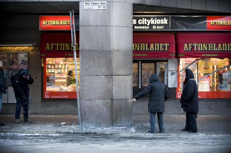 Stockholm attack: A man points at the corner of Olof Palmes Gata and Drottninggatan streets in central Stockholm, where an apparent car bomb exploded on December 11. (JONATHAN NACKSTRAND/AFP/Getty Images) Stockholm attack: A man points at the corner of Olof Palmes Gata and Drottninggatan streets in central Stockholm, where an apparent car bomb exploded on December 11. (JONATHAN NACKSTRAND/AFP/Getty Images)