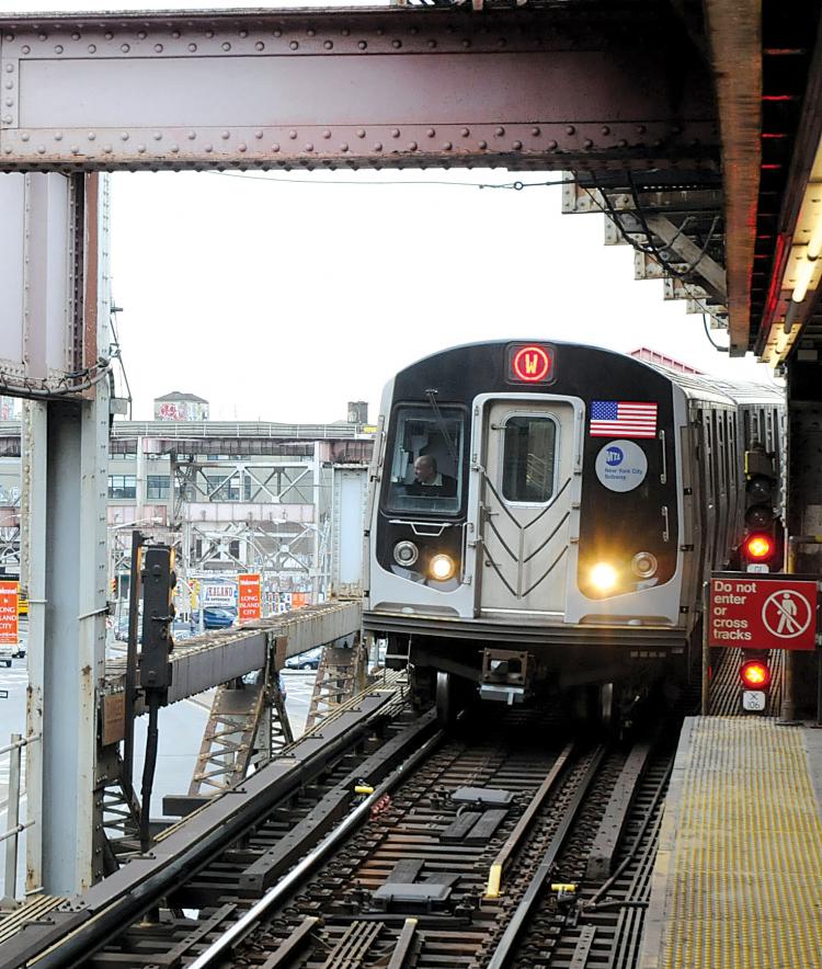 SAY GOODBYE TO W: The MTA, after months of hand wringing by all involved, has gone ahead with a whopping 23 percent fare hike. (Minguo/The Epoch Times)