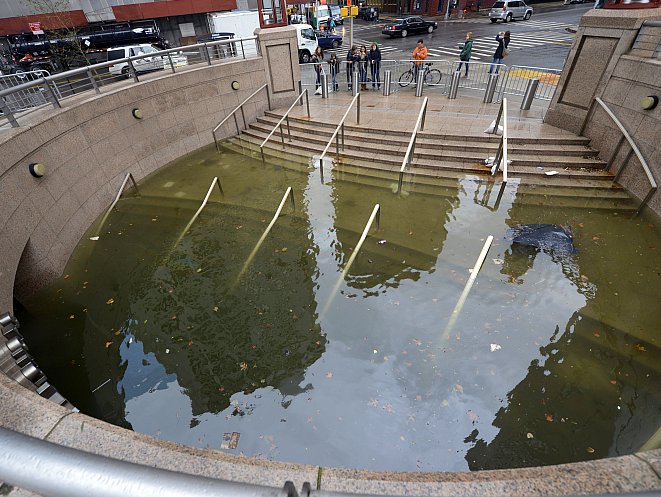 Water still filled the Bowling Green subway station in Battery Park on Oct. 30, as New Yorkers coped with the aftermath of Hurricane Sandy. Researchers estimated damages to the Metropolitan East Coast region could total $100 billion. (TIMOTHY A. CLARY/AFP/Getty Images)