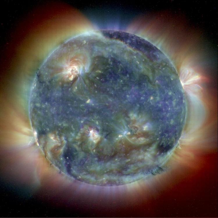 This composite image combines Extreme Ultravoilet Imaging Telescope (EIT) images from three wavelengths (171, 195 and 284 angstrom) into one that reveals solar features unique to each wavelength. Since the EIT images come to us from the spacecraft in black and white, they are color coded for easy identification. (Courtesy of  ESA/NASA/SOHO )
