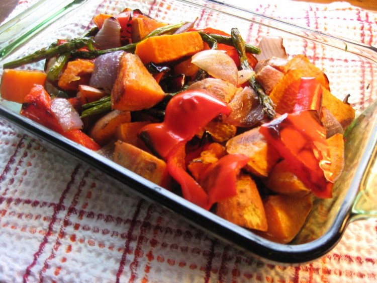 Roasted sweet potatoes and vegetables makes for a scrumptious side dish. (Maureen Zebian/The Epoch Times)