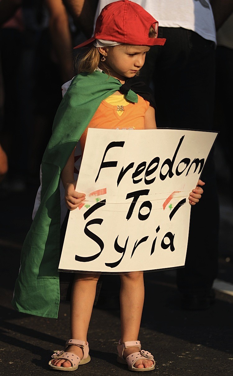 A young girl holds a placard with the slogan 'Freedom to Syria' during an anti-regime protest outside the Syrian embassy in the Cypriot capital Nicosia on July 31. Syrian forces killed nearly 140 people including 100 when the army stormed the flashpoint p (Patrick Baz/AFP/Getty Images)