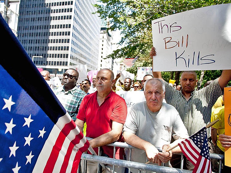 ANTI-PROFILING: Bhairavi Desai, executive director of the New York Taxi Workers Alliance and Taxi drivers protested the recent recommendation of the New York State Federation of Taxi Drivers that drivers should profile their fares based on ethnicity. (The Epoch Times)