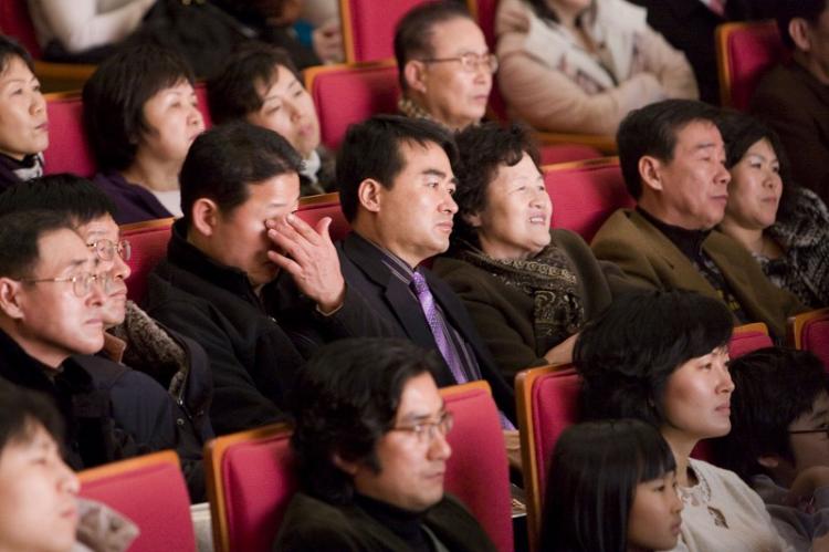 An audience member was moved to tears at the show presented by Divine Performing Arts (DPA) International Company in Daegu, South Korea. (Li Ming/The Epoch Times)