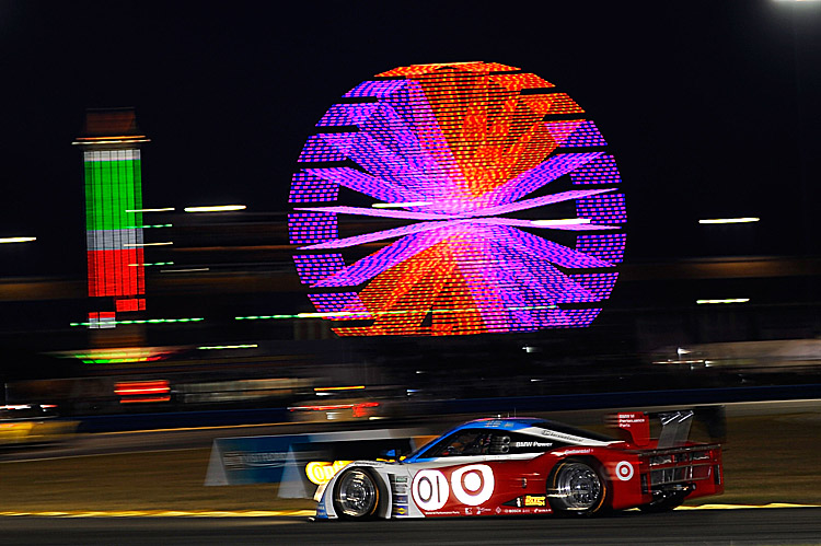 The #01 Telmex-Ganassi of Scott Pruett was second and closing on its sister car, the #02, just after nine hour into the 2012 Rolex 24 at Daytona. (John Harrelson/Getty Images)