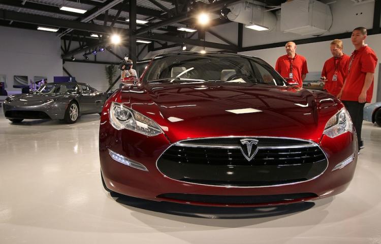 A Tesla Motors Model S is displayed in the Tesla showroom at Tesla Motors headquarters on May 20, in Palo Alto, CA. Shares of Tesla Motors Inc.,  will officially begin trading on Tuesday.  (Justin Sullivan/Getty Images)