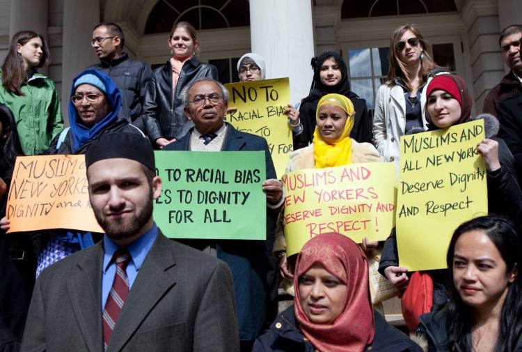 DIGNITY AND RESPECT: Members of the Muslim community, city council members and other supporters gathered on the steps of City Hall on Tuesday to address their concerns of racial stereotyping being done with NYPD recruits.  (Amal Chen/The Epoch Times)
