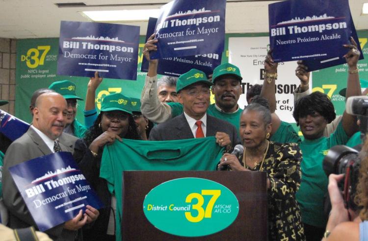 NYC Comptroller William Thompson with leaders of District Council 37 at a press conference on Thursday. The city employee union is endorsing Thompson in his run for the mayor's office, DC37 formerly backed Mayor Bloomberg. (Eyal Levinter/The Epoch Times)