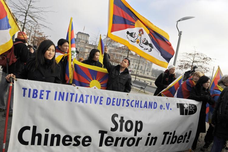 A protest group demonstrates for a free Tibet during a visit by Chinese Premier Wen Jiabao to Berlin on January 29.  (Barbara Sax/AFP/Getty Images)