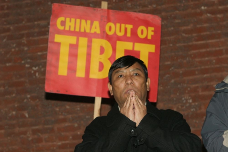 Members of the Tibetan community protest in front of the Chinese Consulate in response to Chinese police brutality over the past few days. (Zhantong Lin/The Epoch Times)