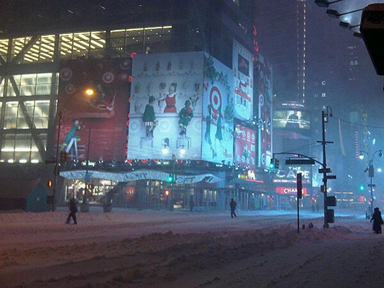 JFK and Newark Airports Reopen: Both airports servicing New York City, along with LaGuardia, were shut down for most of the day Monday, Dec. 27. Pictured is 42nd St. and Broadway in Manhattan early Monday morning. (Jan Jekielek/The Epoch Times)