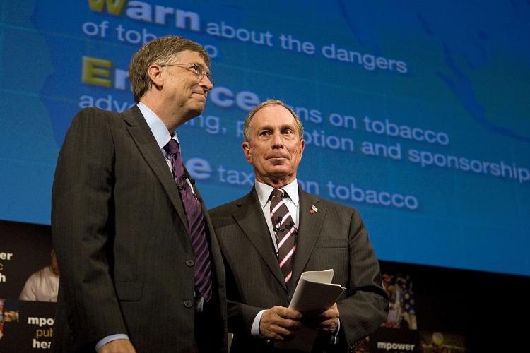 New York City Mayor Michael Bloomberg stands with Microsoft founder Bill Gates at a conference discussing initiatives for battling tobacco use on July 23, 2008. (Shaoshao Chen The Epoch Times)