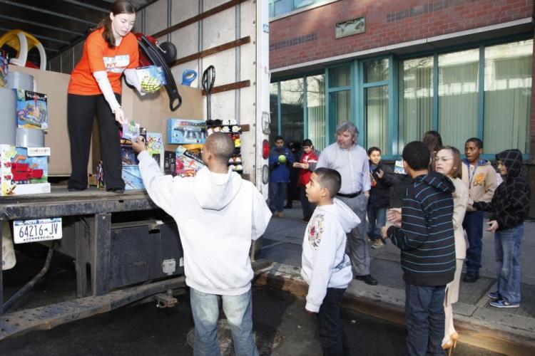 TOY TRUCK: Exhibitors at the American International Toy Fair, held at the Javits Center this week, donated five truckloads of new toys, valued at over $250,000, to benefit children in need. (Photo courtesy of The Toy Industry Foundation)