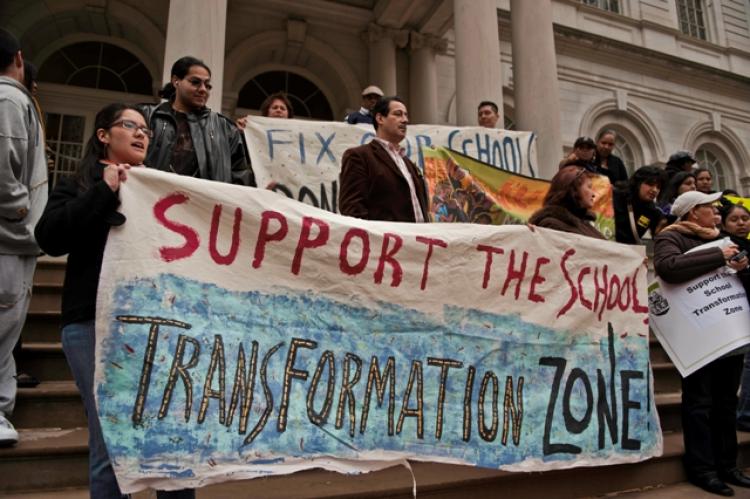 NEW ZONING NEEDED: Parents and advocates rally for the creation of a School Transformation Zone on Wednesday at City Hall. (Aloysio Santos/The Epoch Times)