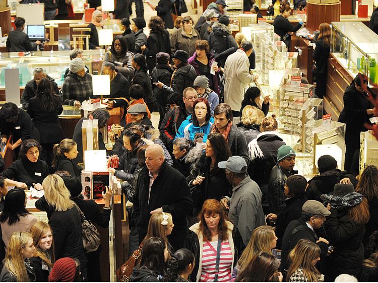 Shoppers pack into Macy's in Manhattan December 16, 2009 in New York. (Don Emmert/AFP/Getty Images)