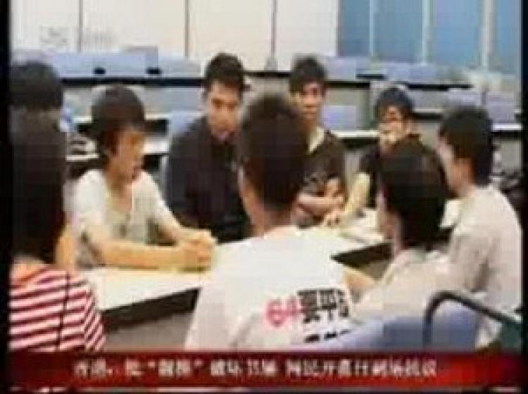 During a talk show broadcast by Shenzhen Satellite TV, a man is seen wearing a T-shirt with the words 'Vindicate June 4' on the back. (TV screenshot)