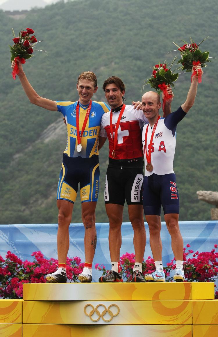 Researchers at the University of British Columbia found that winning athletes tended to raise their arms, tilt their head up and puff out their chest while expressions of defeat were manifested in slumped shoulders and a narrowed chest. (Carl de Souza/AFP/Getty Images)