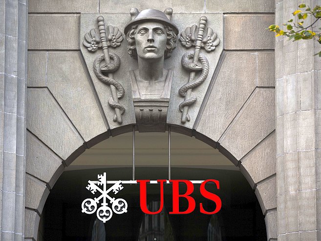 The logo of Swiss banking giant UBS is seen on Oct. 13 in Zurich. The bank could announce layoffs of 10,000 employees this week at its earnings release on Oct. 30.  (Fabrice Coffrini/AFP/Getty Images)