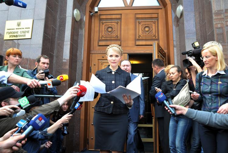 Yulia Tymoshenko (C) walks out of the prosecutor general's office in Kyiv on May 12.  (Genya Savilov/AFP/Getty Images)