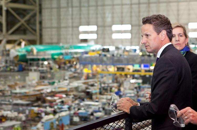 FACTORY ACTIVITY: Treasury Secretary Timothy Geithner looks over the production line during a tour of the Boeing 737 plant earlier this year in Renton, Washington. (Stephen Brashear/Getty Images )