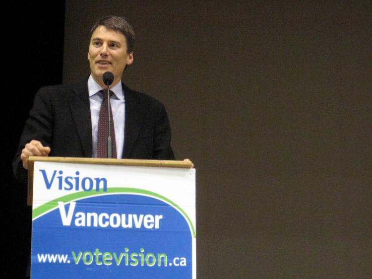 Mayor Gregor Robertson speaks at the Vision AGM to his fellow elected officials and supporters on his 106th day in office.   (Helena Zhu/The Epoch Times)