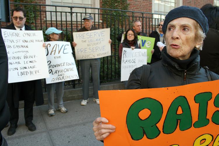 DEMOLITION STANDOFF: Activists protest the planned demolition of a beloved historic theatre, Provincetown Playhouse, in the Village on Monday. The building is owned by NYU, which plans to construct a new law school building on the site. (R) Emily Silver-Fabella Stevens, Producer, Director, Writer. (Katy Mantyk/Epoch Times)