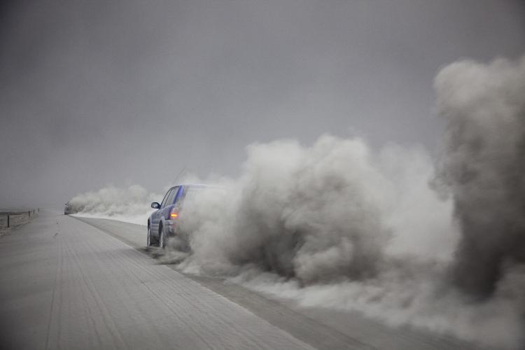 Volcanic scientists leave the area after collecting samples of ash to send to labs to analyze its content, in eastern Iceland on April 15, 2010. A cloud of ash from the Eyjafjallajkull volcano in Iceland, which erupted on the morning of April 14, 2010, is likely to disrupt European airspace for 'several days', a global association of air traffic control companies said today. (Omar Oskarsson/AFP/Getty Images)