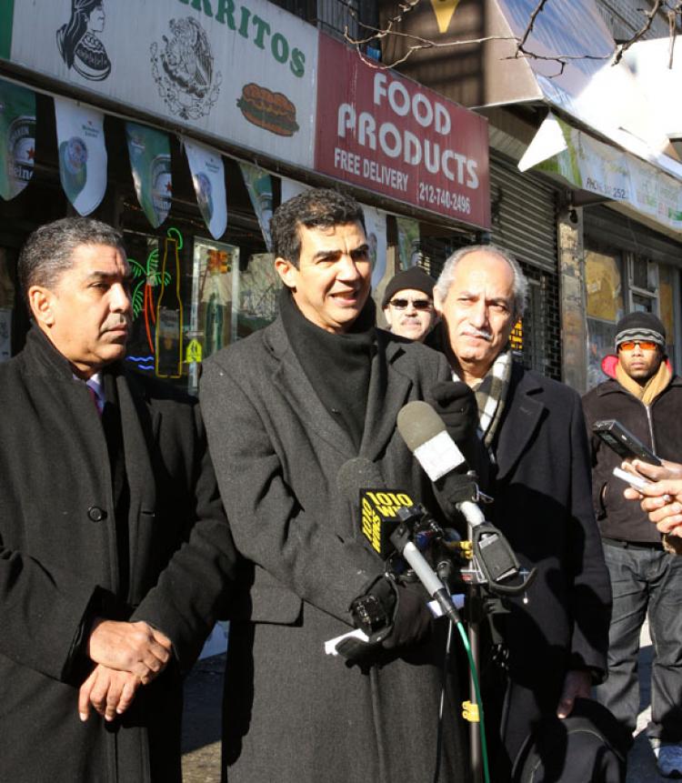 CRIME SCENE: State Sen. Adriano Espaillat (L), Councilman Ydanis Rodriguez (C), and Assemblyman Guillermo Linares (R) stand in front of a bodega on West 188th Street in New York City on Sunday, where a young man was fatally stabbed on Jan. 21.  (Tara MacIsaac/The Epoch Times)