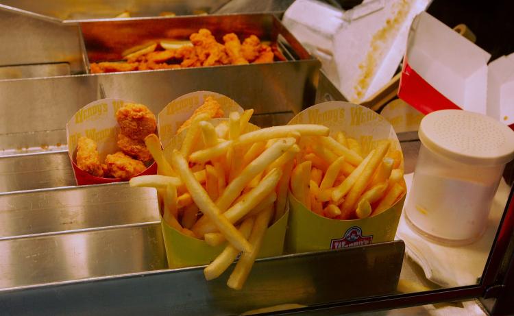 Wendy's french fries and chicken nuggets wait to be placed in an order June 8, 2006 in Miami, Florida.  (Joe Raedle/Getty Images)