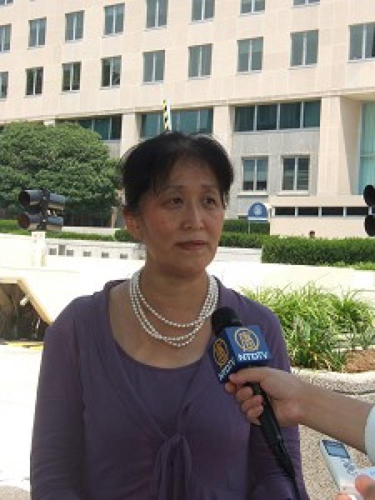Dr. Wenyi Wang speaking in Washington D.C. about death threats she received in Flushing, New York from violent pro-Chinese Communist Party mobs. (Epoch Times)