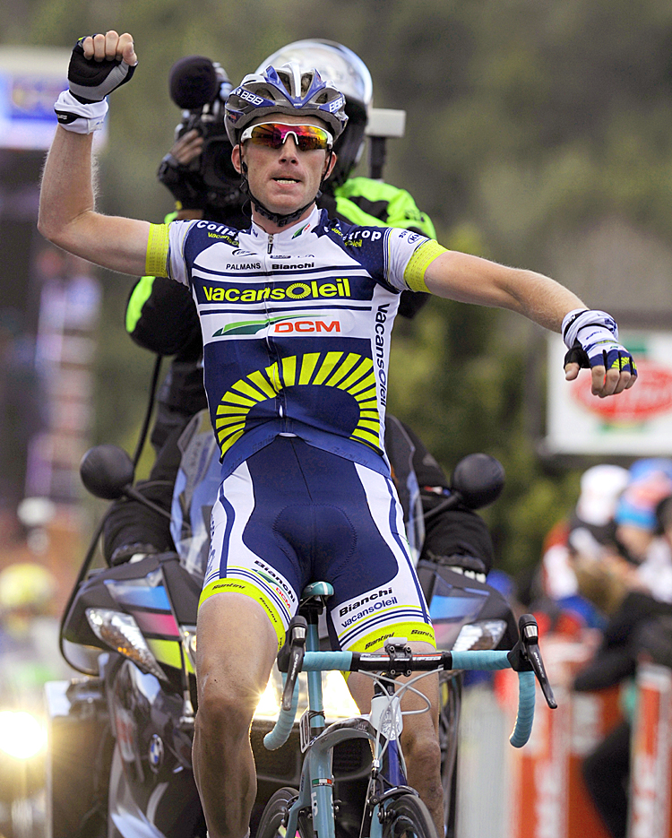 Vacansoleil's Lieuwe Westra punches the air with pride as he crosses the line to win Stage Five of the Paris-Nice cycling race. (Pascal Pavani/AFP/Getty Images)