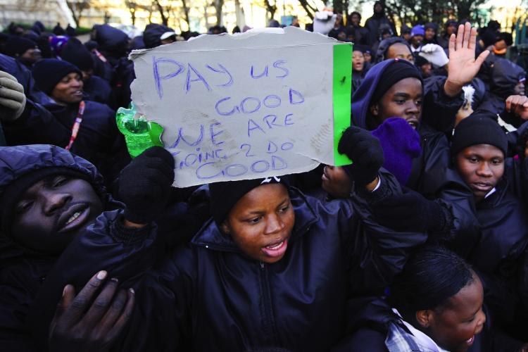 Stewards providing security at Johannesburg's Ellis Park stadium stage a walk-out on June 15, 2010 in Johannesburg hours before Brazil's match against North Korea in the 2010 World Cup football tournament.  (Fabrice Coffrini/AFP/Getty Images)