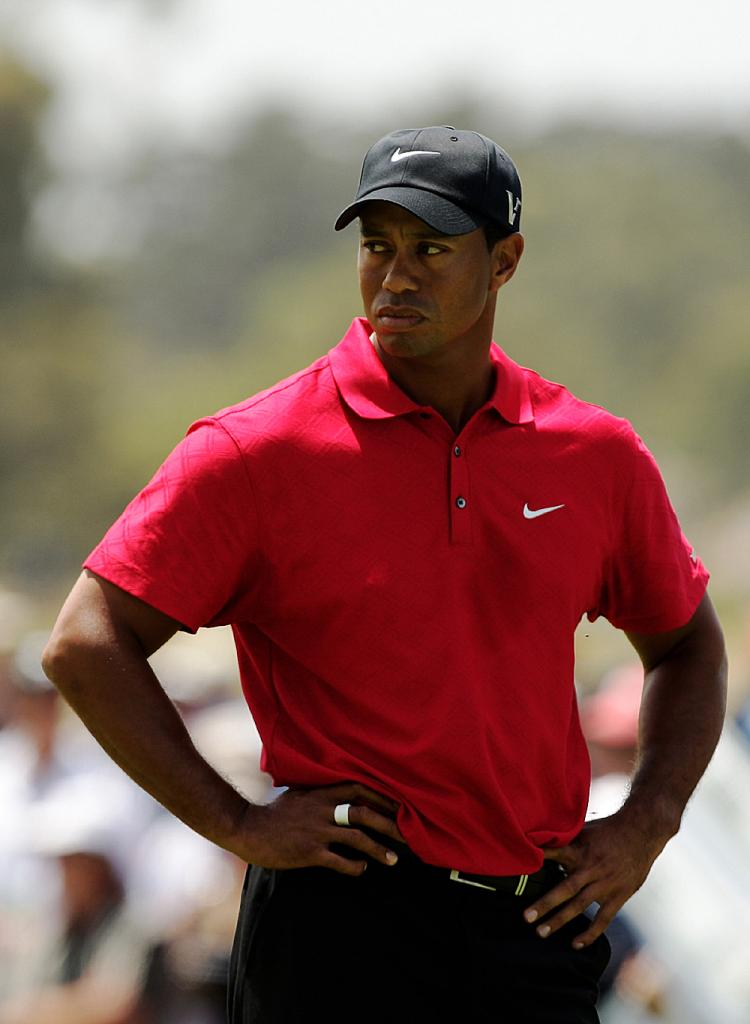 Tiger Woods is just the latest in a long list of sports stars behaving badly. (Mark Dadswell/Getty Images)