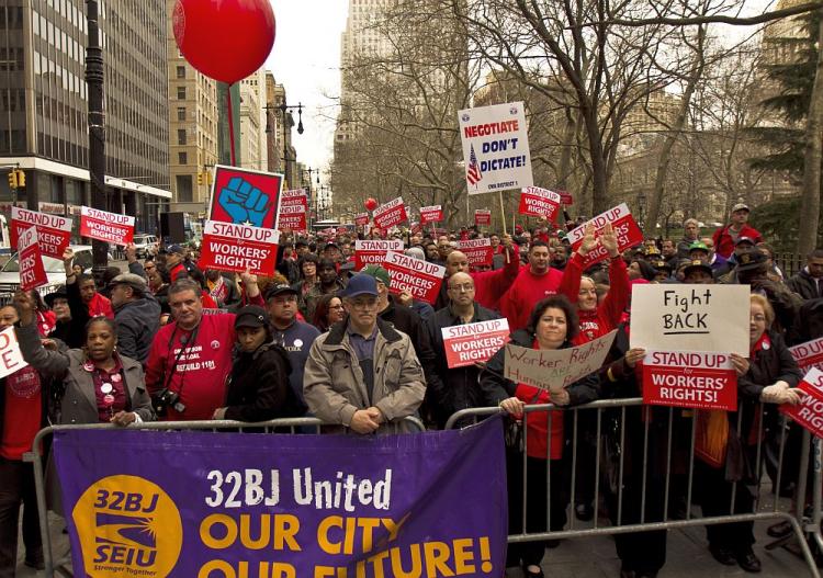 UNIONS REMEMBER KING: Union workers gather at City Hall Park on Monday to remember Martin Luther King Jr.'s support of worker rights before he was shot on April 4, 1968.  (Phoebe Zheng/The Epoch Times)